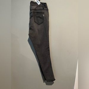 Women’s mid rise skinny with frayed hem jeans